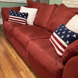 Red Couch Barely Used From Ashley’s Furniture Store