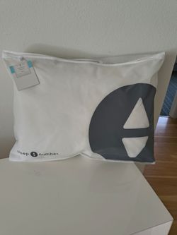 Sleep number curved plush pillow