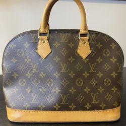 LOUIS VUITTON Alma Hand Zipped Bag