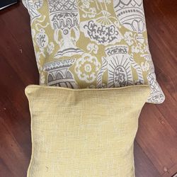 Pair Of Yellow Throw Pillows