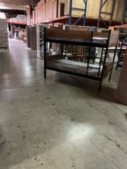 Twin bunk bed. Available in espresso, white, & grey. Bunk bed only-$220. With mattresses-$399. Assembly required. Assembly not included. Tax included.