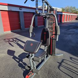 HomeGym Machine 150 Pounds  Weights Stucks.  13 Exercises over. Delivery for extra