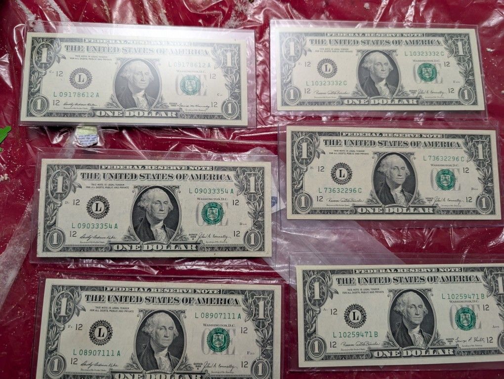 1969, 1974 And 1977 Dollar Bill Uncirculated And Circulated.