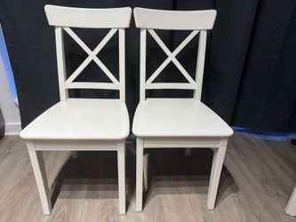 Two White Dining Chairs