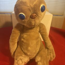 The vintage E.T. the Extra-Terrestrial plush doll.  1982 
