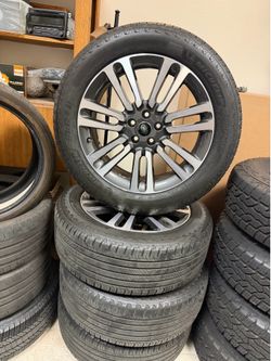 21” RANGE ROVER STOCK RIMS AND TIRES