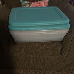 Four Plastic Containers For Storage 
