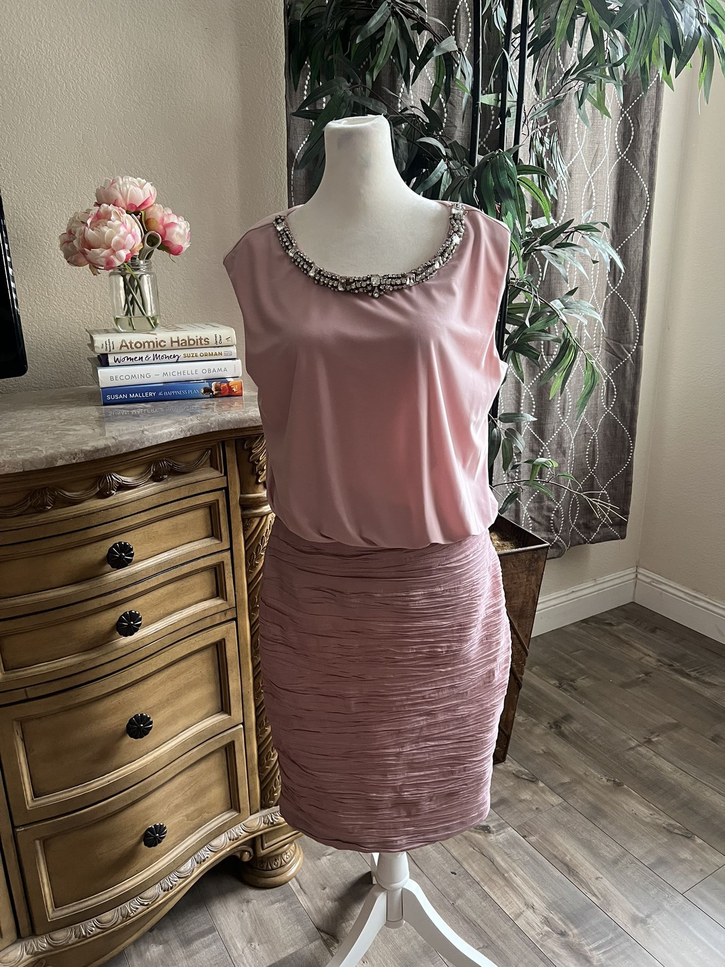 Woman’s light pink dress size 10