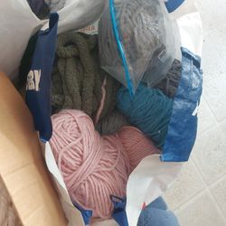 Pile Of Yarn And Knitting Needles