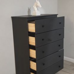 Black Wood Dresser. Used, in very good condition. All drawers glide smoothly!

33.5"W x 17"D x 49"H 

Chest Of Drawers 

$175