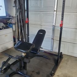 Olympic Squat Rack With Pull up Bar & Adjustable Bench with Leg Developer & Preacher Pad & curl bar.