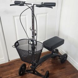 KNEE SCOOTER/WALKER.  BLACK MATTE FRAME. DUAL BRAKES w/LOCKING. ADJUSTABLE. FOLDABLE. BASKET. EXCELLENT CONDITION!