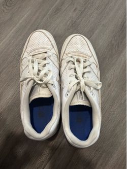 Men’s white Nike shoes