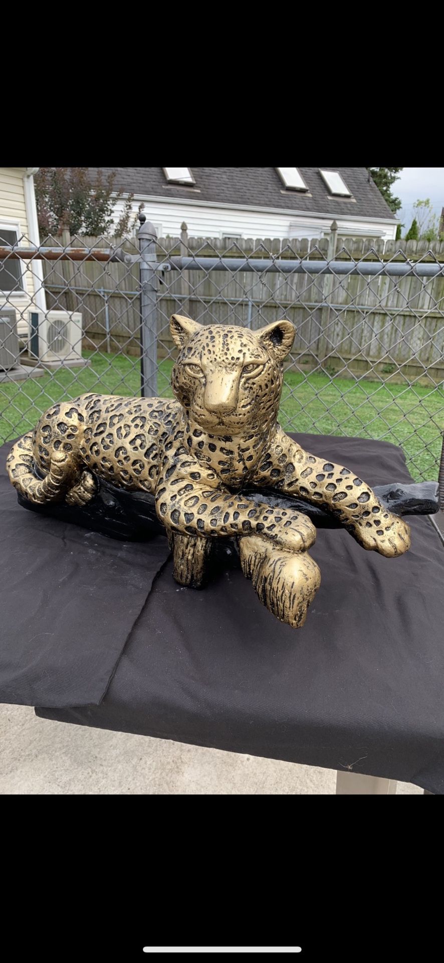Golden Leopard On The Log Statue