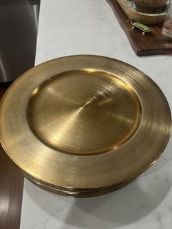 18 plates like new gold charger plates
