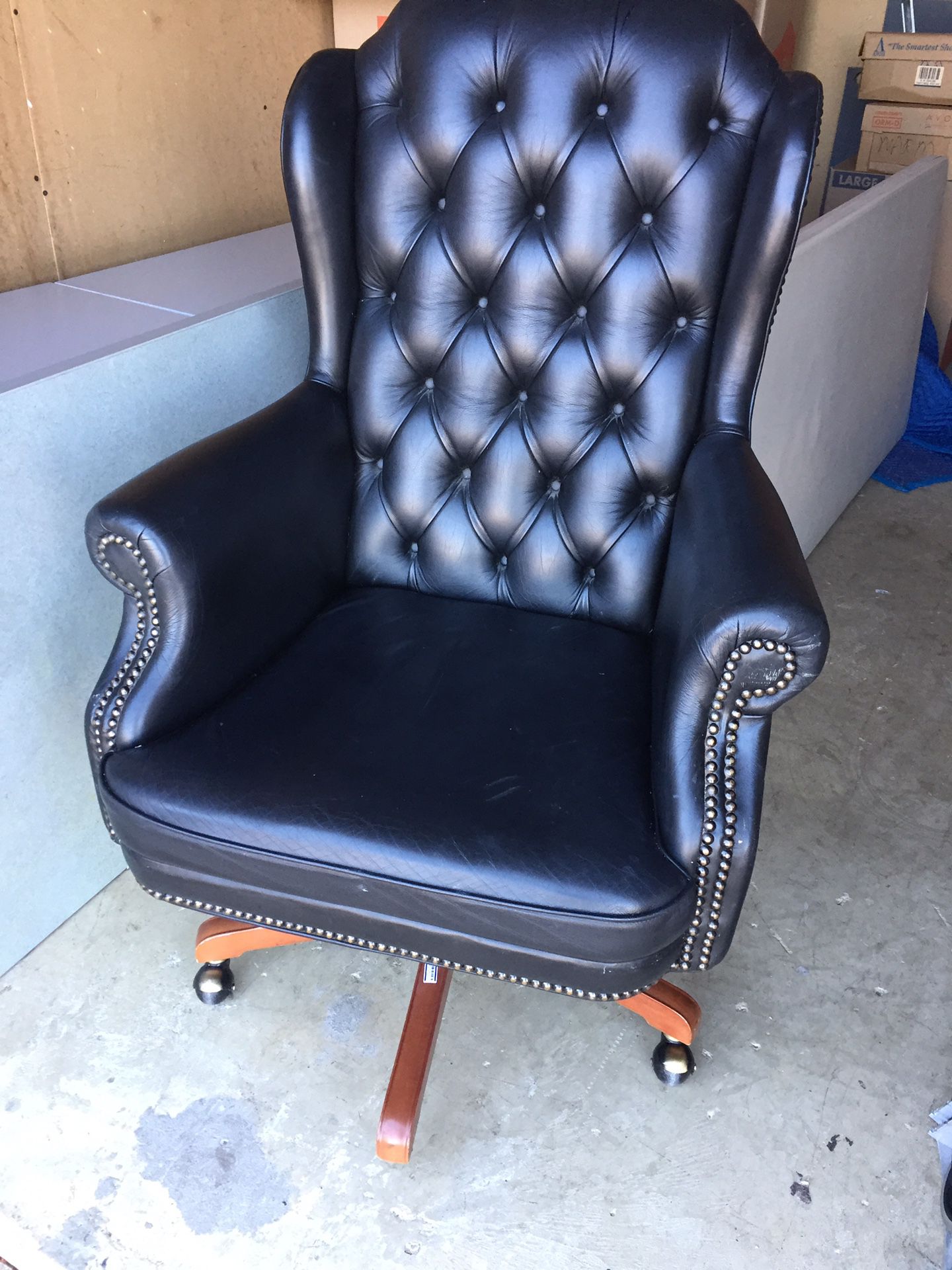 Blue leather tufted desk office chair.