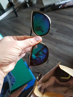 Cut Chameleon Color Sun Glasses. New. Tiny Scuff Hardly Seen.