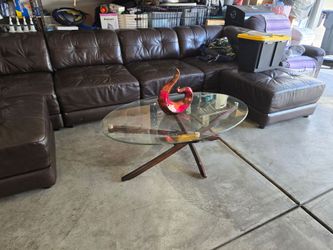 Brown leather sectional couch