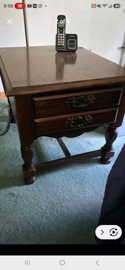 Rectangular coffee tables with huge drawer underneath a pair of them