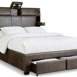 Signature Design by Ashley Mirlenz Queen Upholstered Bed with Storage-Brown