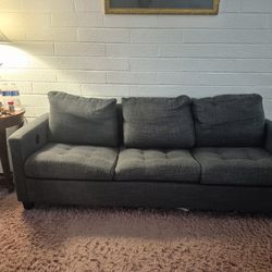 BEAUTIFUL DARK GRAY  72" WIDE  3-4 SEATER COUCH WITH PHONE CHARGER. USB PORTS***