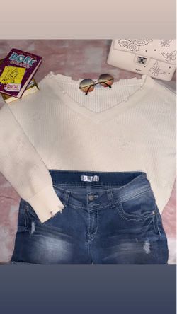Distressed sweater.