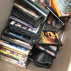 Various DVDs And A Player
