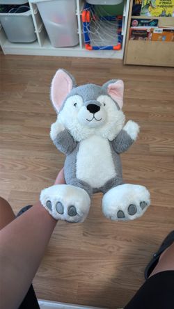 Grey and white dog stuffed animal