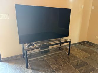 Glass Tv stand. Excellent condition. Stand only tv not included