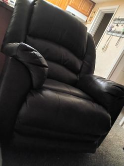 2 brown nice leather chairs