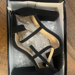 women’s black heels. size 8.5 brand new. never worn.