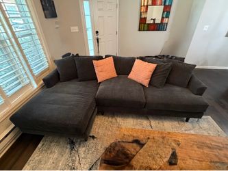Dark gray sectional sofa with left facing chaise