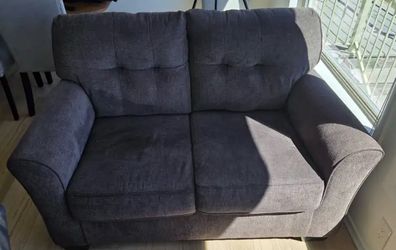 Grey love seat