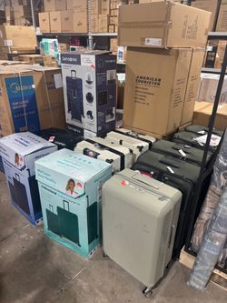 Assorted Carry on sized Luggage