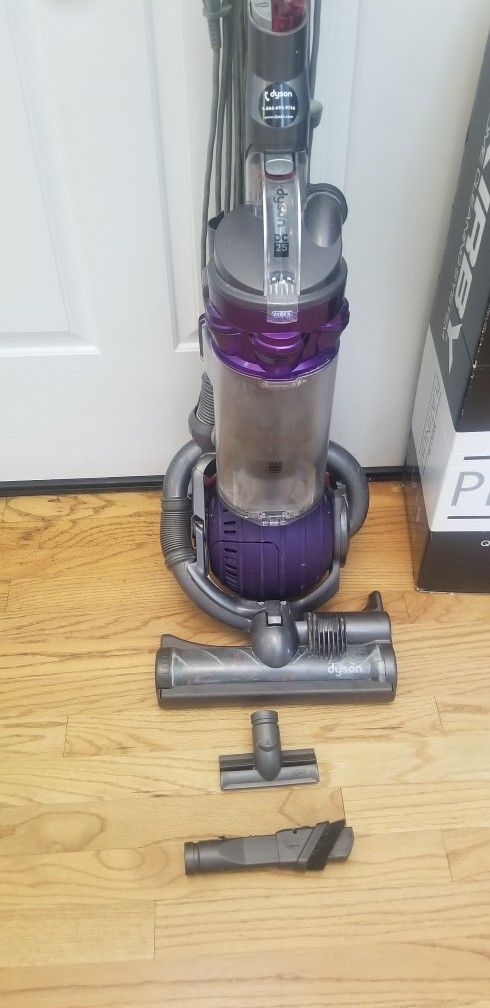 NEW cond DYSON DC25 ANIMAL VACUUM WITH ATTACHMENTS , AMAZING POWER SUCTION , WORKS EXCELLENT. ,