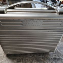 Briefcase heavy duty plastic with inserts, straps and pouch.