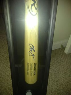 Authentic signed chipper jones sighed bat in UV protected case with certificate of authenticity