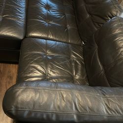 Brown Italian-leather sectional sofa.