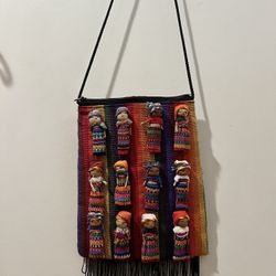 Colorful Handmade Doll bag. Unique and make a great gift. See pictures. Size 6,5x9 inches  This vibrant handmade women bag features a unique design wi