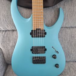 Used  Jackson Pro Series Misha Mansoor Signature Juggernaut HT6 Matte Blue Frost Solid Body Electric Guitar