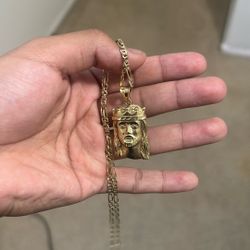 14kt chain with 10k jesus pendant 