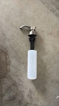Under counter soap dispenser