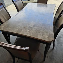 Table And 6 Chairs  Table Its Marmol Good Condition Chairs A Litte Bad