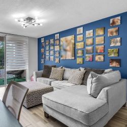  Gray Sectional Couch Sofa With 4 Decorative Pillows And Ottoman From Rooms To Go