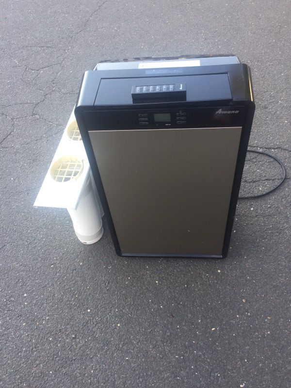 Amana portable air conditioner 14000 btu with remote control barely used works good
