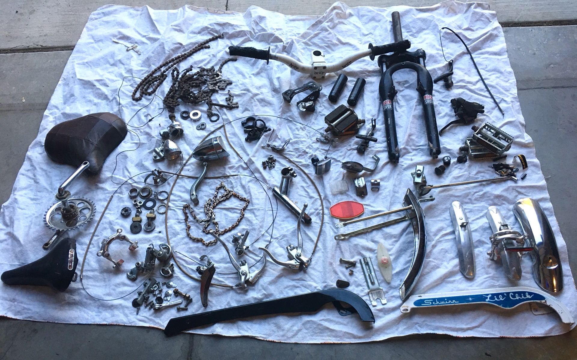 Big Lot Of Vintage Schwinn bike parts as well as deity rock shox etc