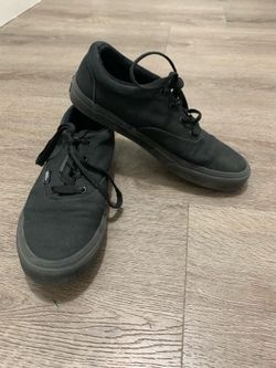 Black Vans sneakers