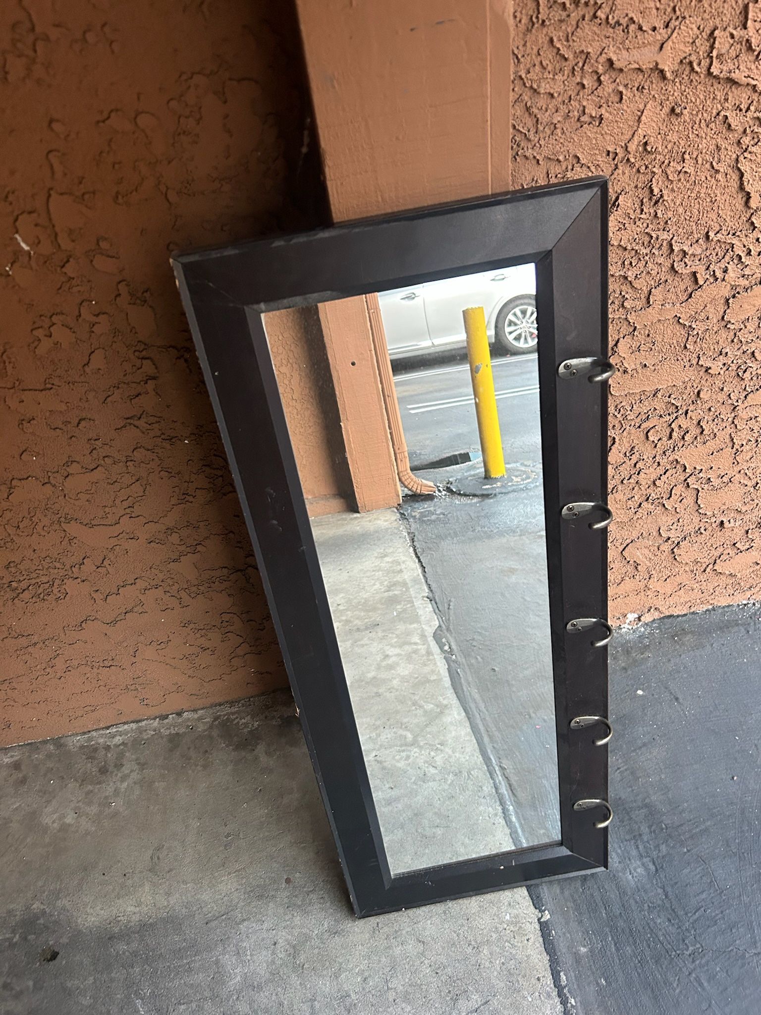 Pub mirror with hooks