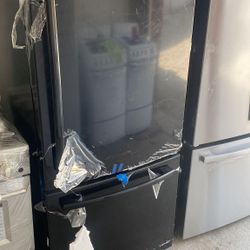 GE fridge warranty  30 inches    black icemaker  botton freezer