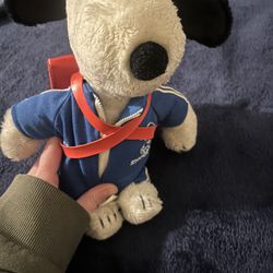 vintage snoopy plushie with 1958 backpack